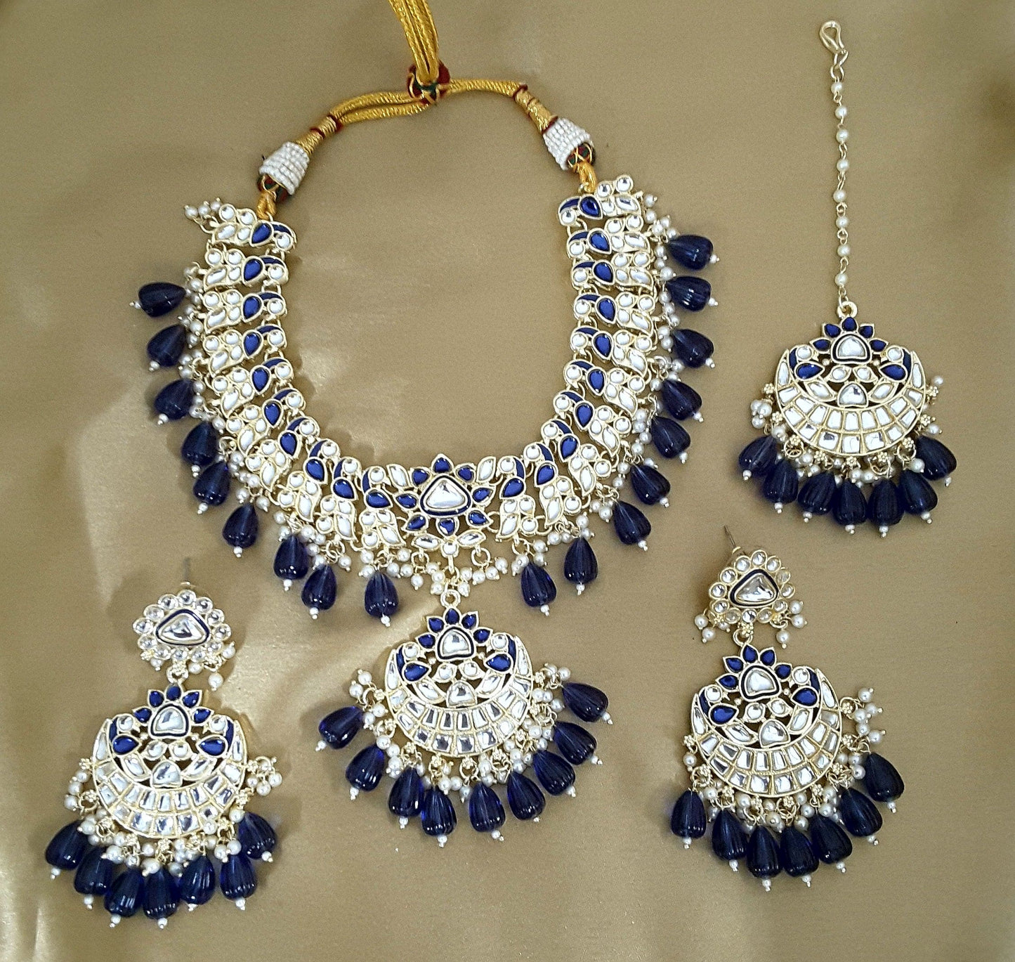 Moonstruck Traditional Indian Peacock Design White Kundan and Blue Beads Choker Necklace Earring Set with Maang tikka for Women(Blue) - www.MoonstruckINC.com
