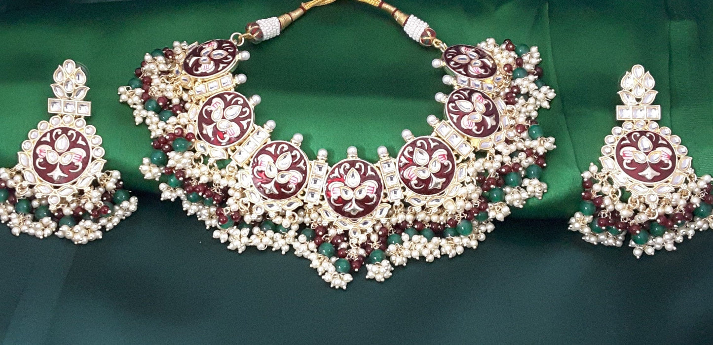 Moonstruck Traditional Indian Maroon Meenakari White Kundan and Green Beads Elegant Necklace Earring Set with Maang tikka for Women(Green & Maroon) - www.MoonstruckINC.com