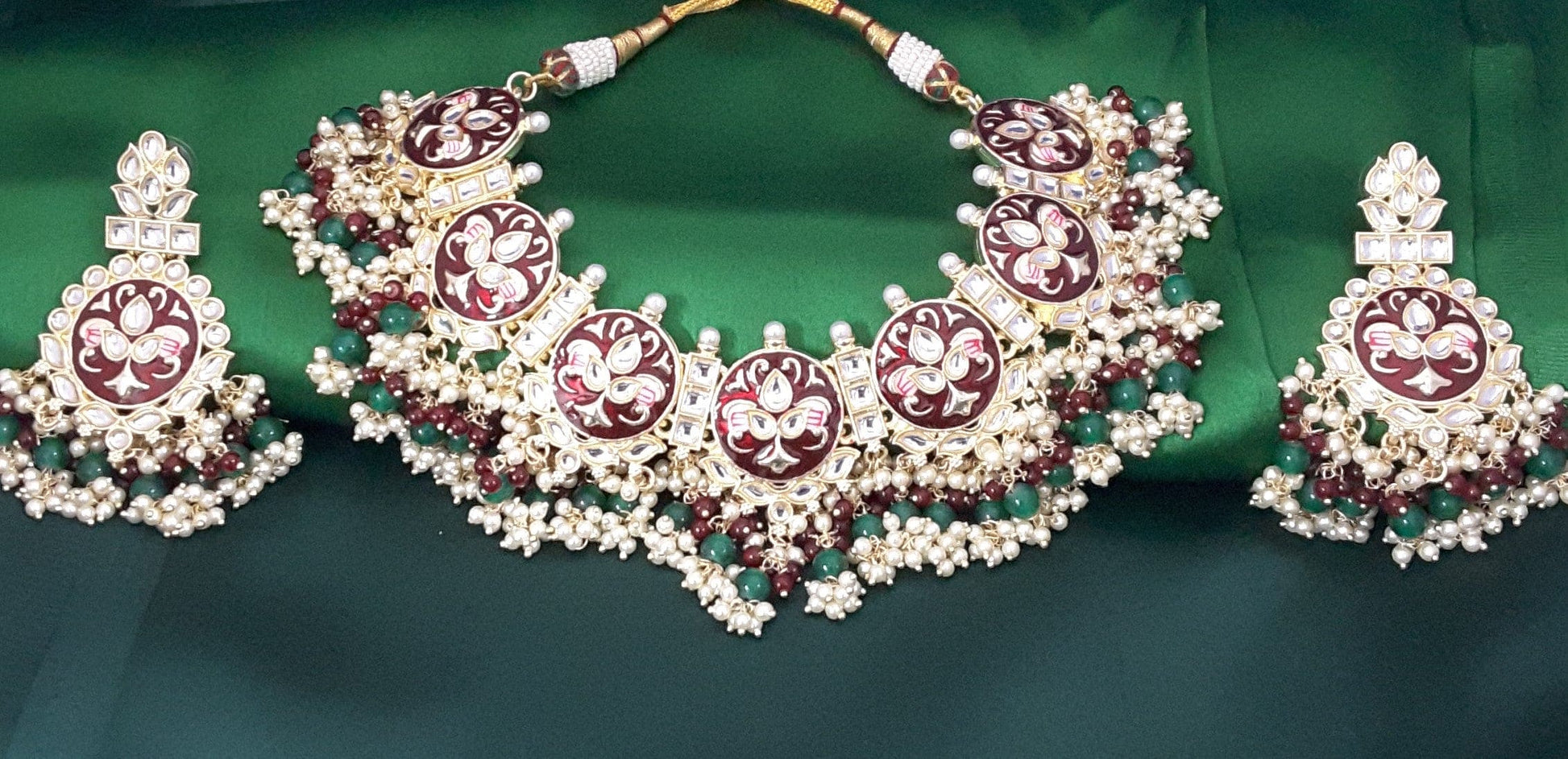 Moonstruck Traditional Indian Maroon Meenakari White Kundan and Green Beads Elegant Necklace Earring Set with Maang tikka for Women(Green & Maroon) - www.MoonstruckINC.com