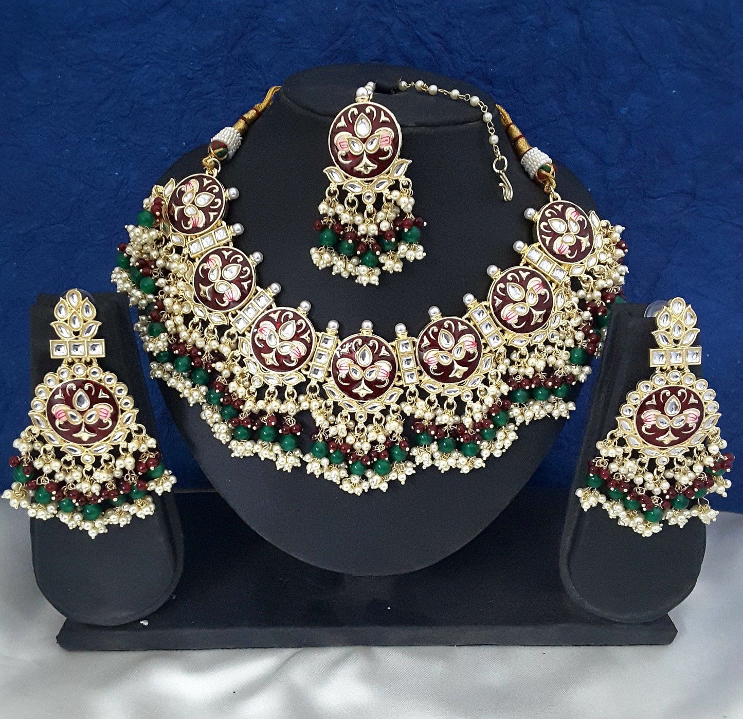Moonstruck Traditional Indian Maroon Meenakari White Kundan and Green Beads Elegant Necklace Earring Set with Maang tikka for Women(Green & Maroon) - www.MoonstruckINC.com