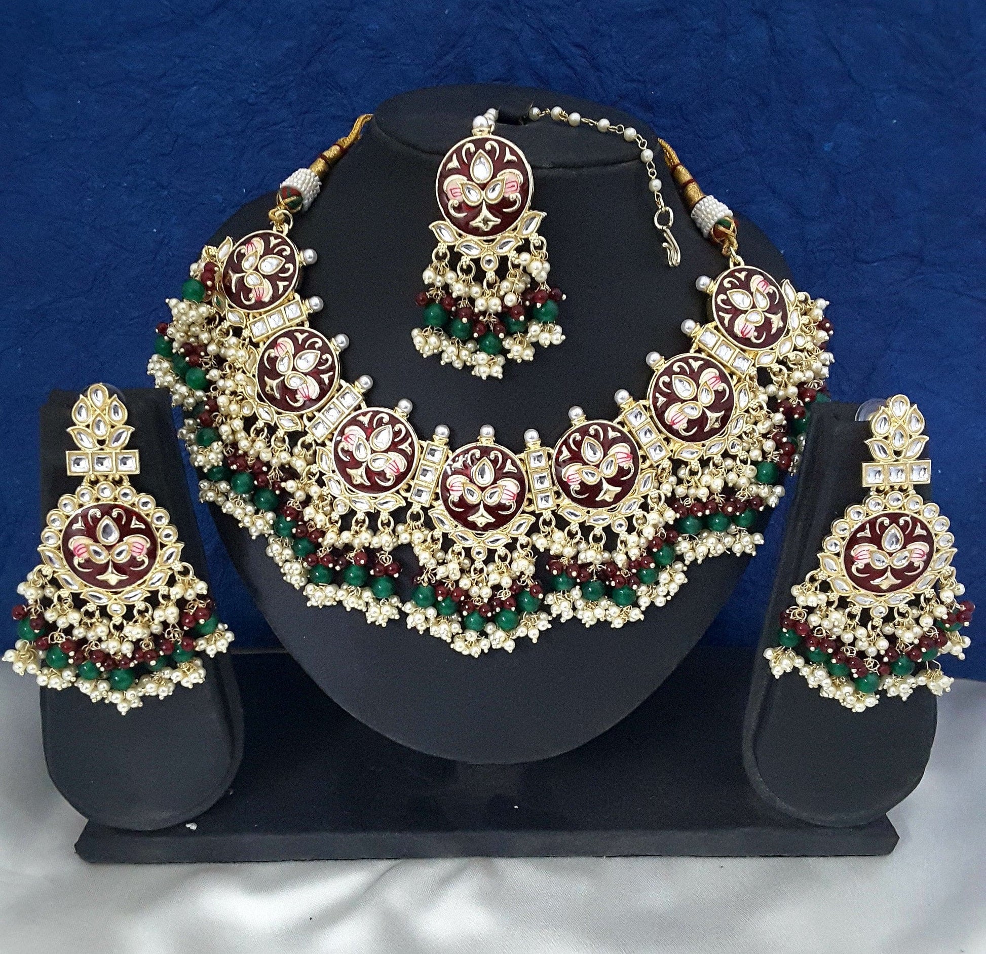 Moonstruck Traditional Indian Maroon Meenakari White Kundan and Green Beads Elegant Necklace Earring Set with Maang tikka for Women(Green & Maroon) - www.MoonstruckINC.com