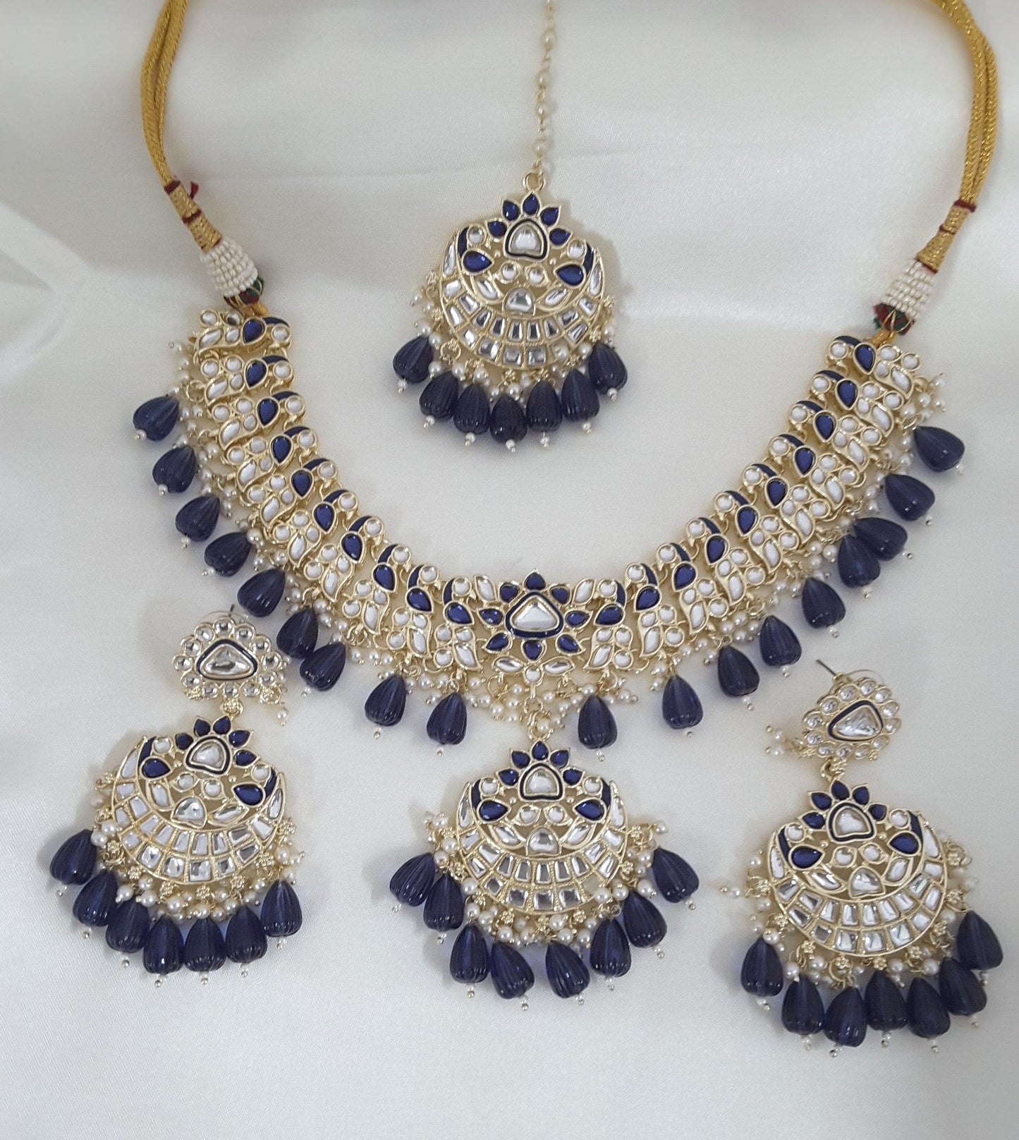 Moonstruck Traditional Indian Peacock Design White Kundan and Blue Beads Choker Necklace Earring Set with Maang tikka for Women(Blue) - www.MoonstruckINC.com