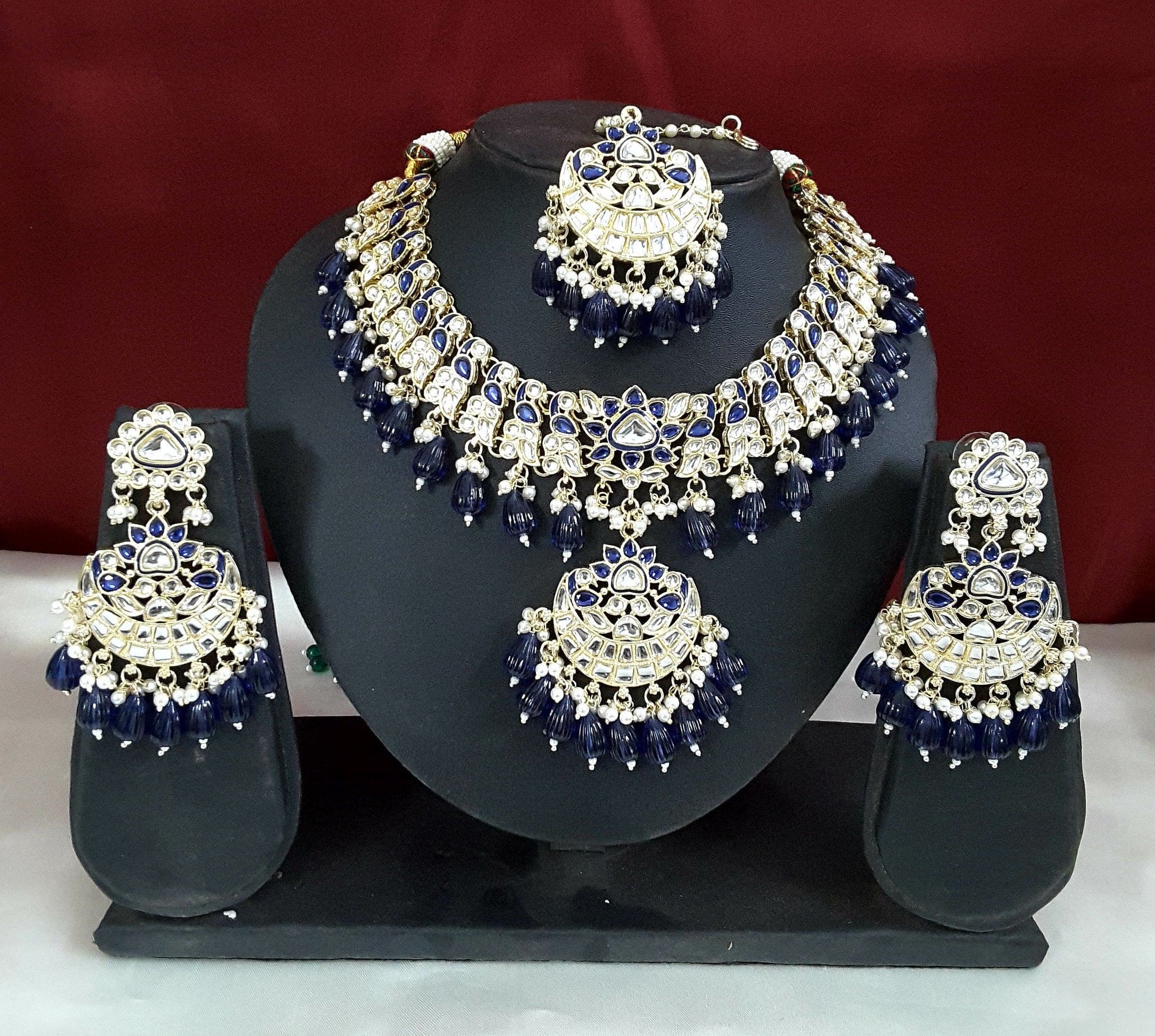 Moonstruck Traditional Indian Peacock Design White Kundan and Blue Beads Choker Necklace Earring Set with Maang tikka for Women(Blue) - www.MoonstruckINC.com
